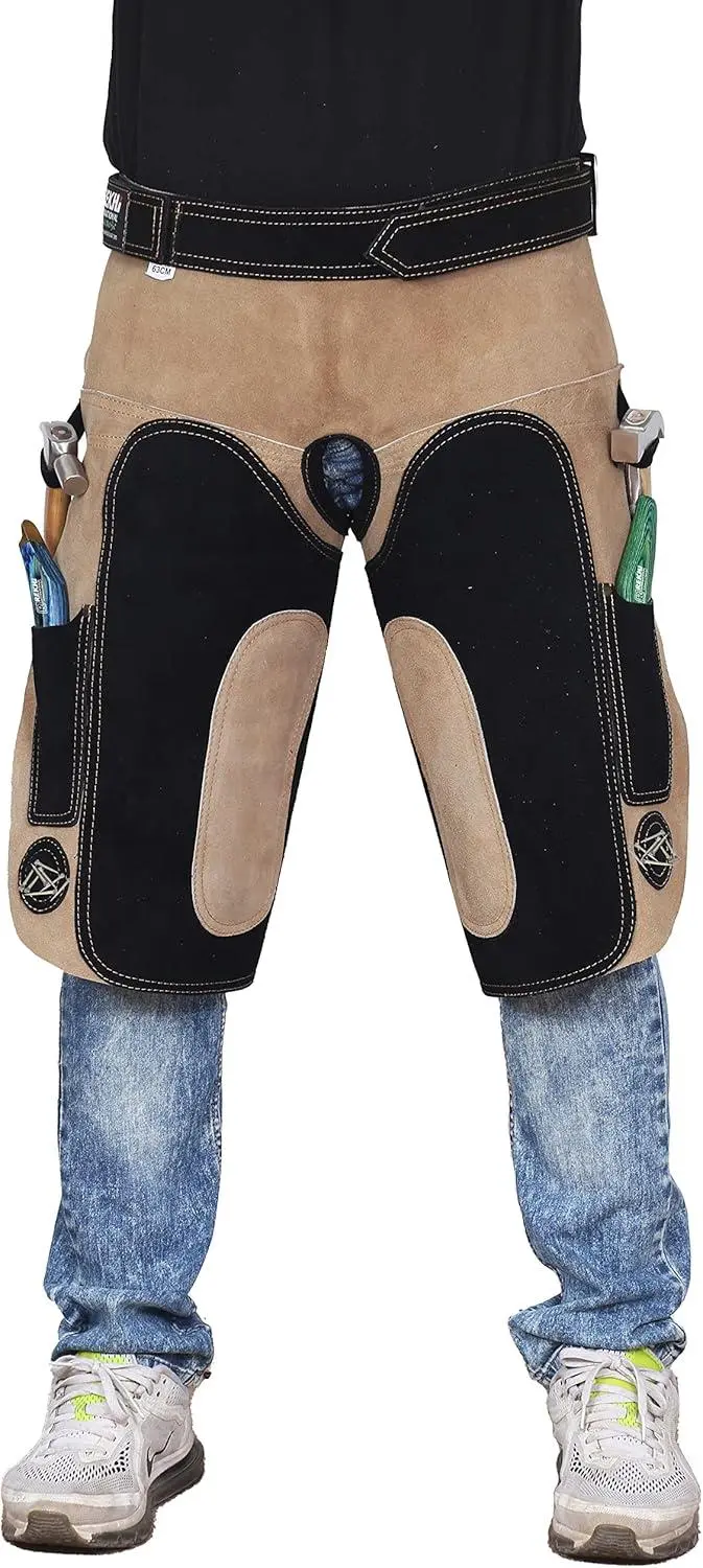 Farrier wearing protective leather chaps